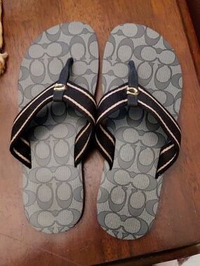 Coach Black and Gray Signature Logo Flip Flops with Gold Accent